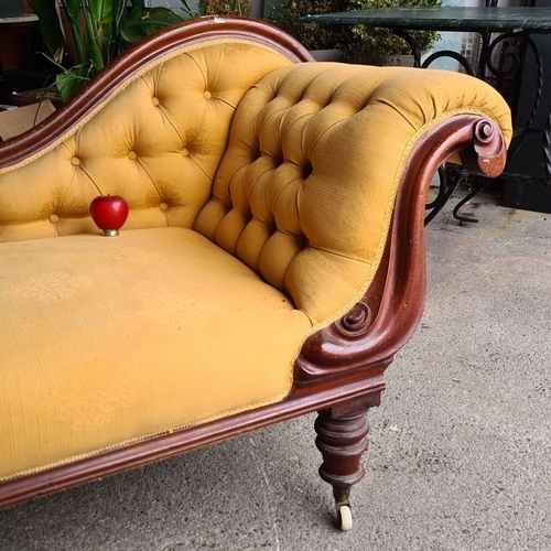 884 - Victorian chaise longue with carved mahogany frame and mustard upholstery. It features a tufted back... 