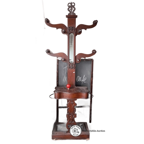 885 - Victorian mahogany hall tree with mirror and storage compartment. Features ornate scrollwork and hoo... 