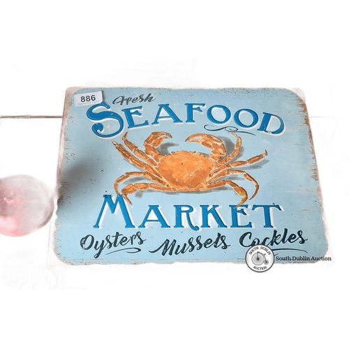 886 - Vintage-style seafood market sign featuring a crab, printed on distressed wood. Dimensions approxima... 