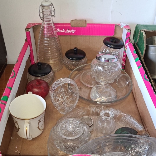 889 - Mixed lot of glassware and ceramics, including various jars with lids, a ridged glass bottle, dishes... 