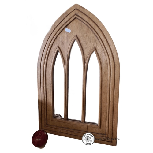 895 - Gothic Revival-style wooden mirror with arched design. Approximately 70 cm high.