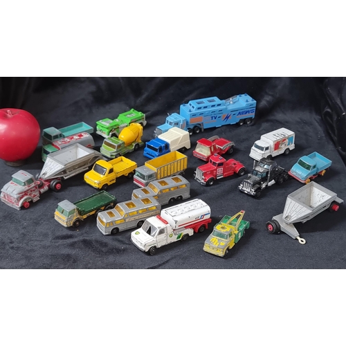 696 - A collection of vintage die cast model cars including some Matchbox examples all relating to transpo... 