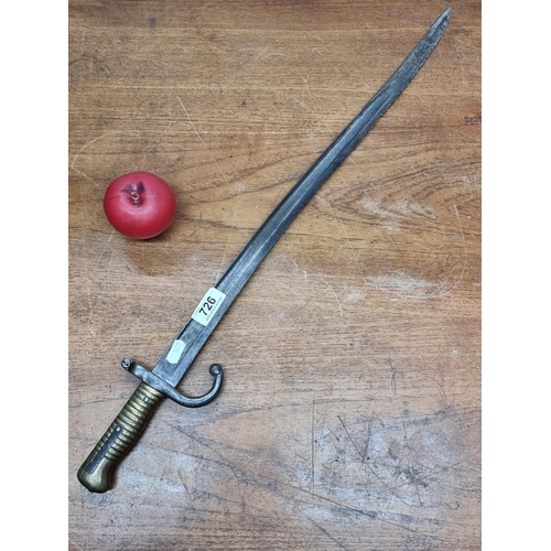 726 - A stunning French M1866 sword bayonet from the Chasspot and Gras Rifles. Features a ribbed brass hil... 