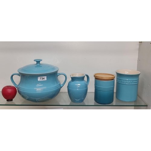 734 - Four fabulous pieces of Le Creuset including a large doubled handled lidded soup pot, a water jug an... 