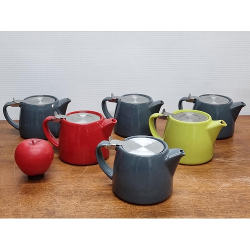 762 - Six fourlife stump ceramic stackable teapots in the colours red, grey and lime green, all in good co... 