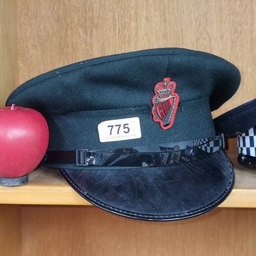 775 - A Royal Ulster constabulary cap.