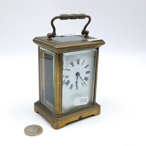 963 - An antique mechanical carriage clock. Marked made in France. nice clean example with glass sides and... 