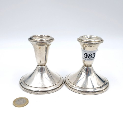 983 - Two Irish Silver dwarf candlesticks with good clear Dublin hallmarks. Total weight 420g filled.