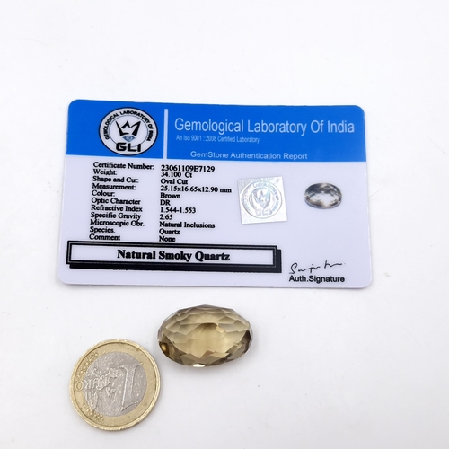 1082 - A natural smoky quartz oval stone cut of 34.1 carats. Comes with certificate of authenticity.
Previo... 