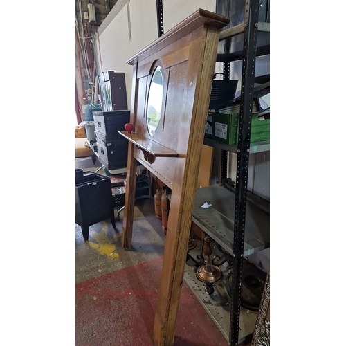 902 - Star Lot : A beautiful large Oak fireplace surround with an oval mirror insert. Approximately 160 cm... 