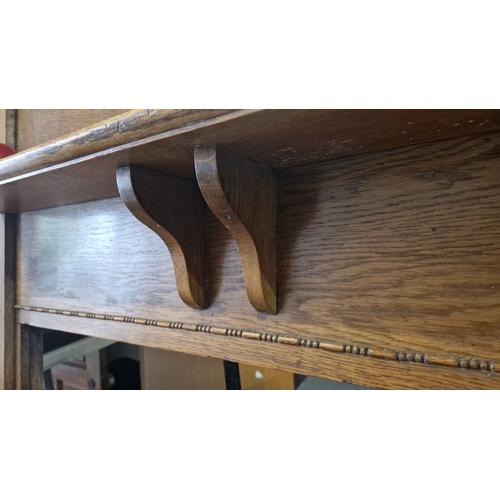 902 - Star Lot : A beautiful large Oak fireplace surround with an oval mirror insert. Approximately 160 cm... 