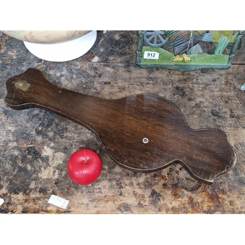 911 - Antique British barometer featuring carved oak design, thermometer, and barometric dial. 