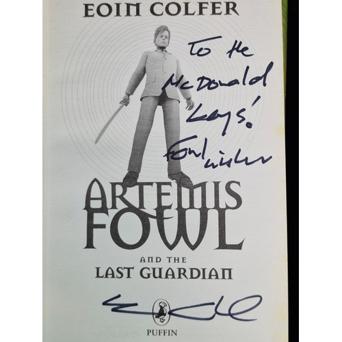 151 - Two hardback copies of Artemis Fowl both signed by the author Eoin Colfer.