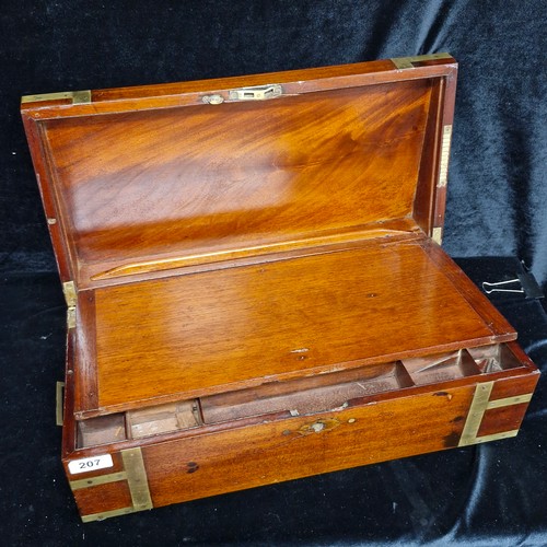 207 - A large Mahogany antique writing slope with brass hardware and additional compartments for stationar... 