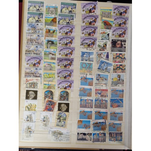 242 - Four stamp collector albums. Includes three A4 examples which are full of AU unmounted Canadian, New... 