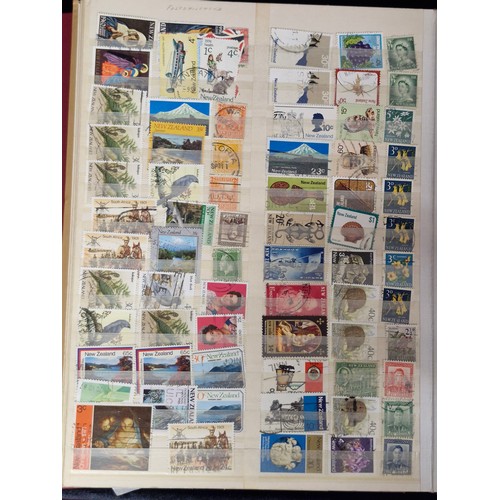 242 - Four stamp collector albums. Includes three A4 examples which are full of AU unmounted Canadian, New... 