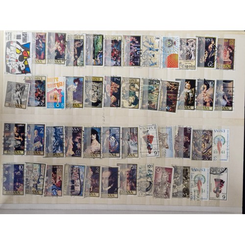 242 - Four stamp collector albums. Includes three A4 examples which are full of AU unmounted Canadian, New... 