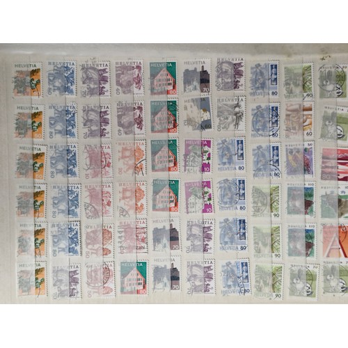 242 - Four stamp collector albums. Includes three A4 examples which are full of AU unmounted Canadian, New... 