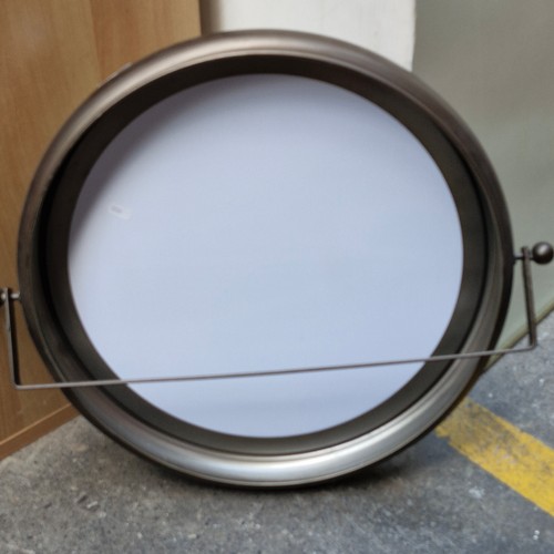 299 - A nice example of a wall mount round hinged bevelled mirror with tilt mechanism. From a top UK desig... 