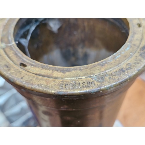 327 - A large vintage brass artillery shell. Height: 76 cm