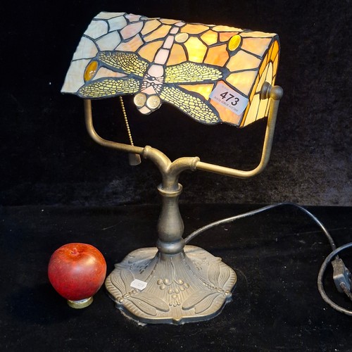 473 - Star lot : A Tiffany-style table lamp with dragonfly motif stained glass shade and ornate cast metal... 