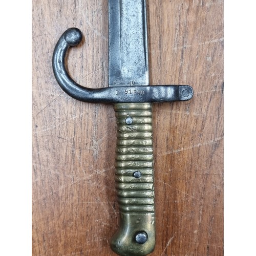 726 - A stunning French M1866 sword bayonet from the Chasspot and Gras Rifles. Features a ribbed brass hil... 