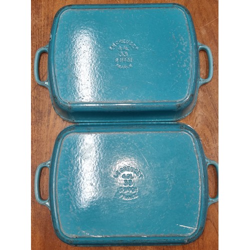 766 - Two very heavy cast iron 'Le Creuset' baking dishes. In an aqua blue shade. Similar on line for €272... 