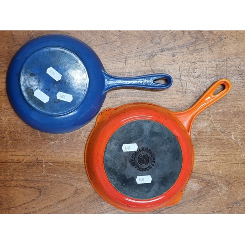 772 - Two Le Creuset mini cast iron pans one featuring two spouts. Both in good condition.