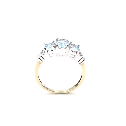 3 - Star lot : A stunning nine carat gold three stone topaz ring set with diamonds. Size - O. Weight - 2... 