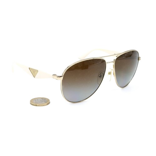 22 - A pair of original designer Prada aviator style sunglasses 'Made in Italy'. Marked polarised and ser... 