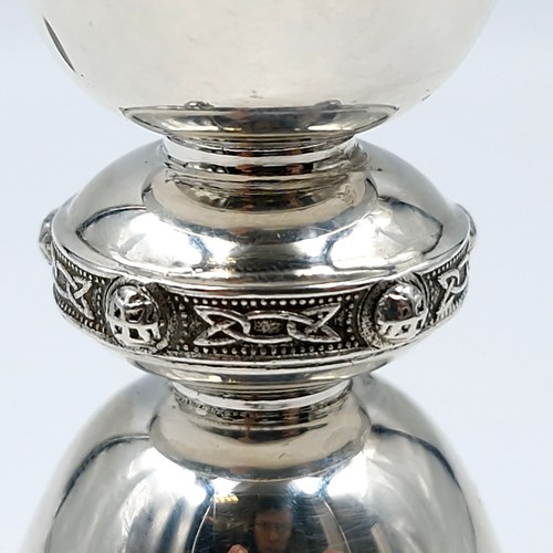 25 - Star Lot : A Super Irish silver spirits double measure set with a celtic band and silver gilt lining... 