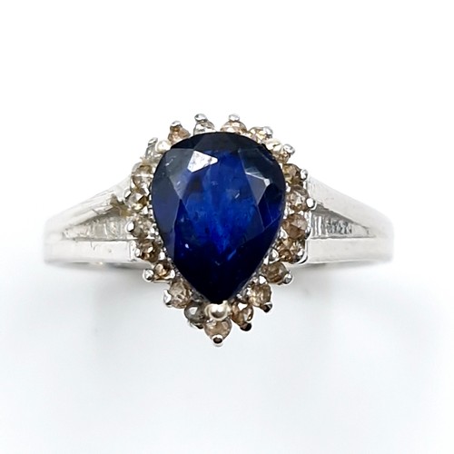 504 - Star Lot : A heart shaped sapphire stone ring with diamond surround set in sterling silver. Ring siz... 