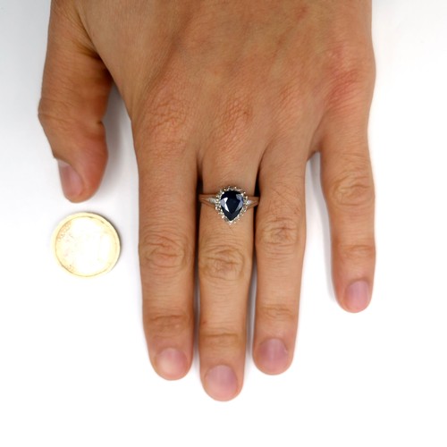 504 - Star Lot : A heart shaped sapphire stone ring with diamond surround set in sterling silver. Ring siz... 