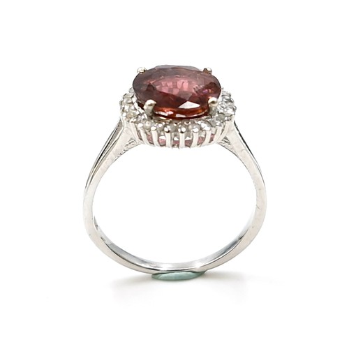 509 - Star Lot : A pretty tourmaline gemstone ring with diamond mount set in sterling silver. Ring size - ... 