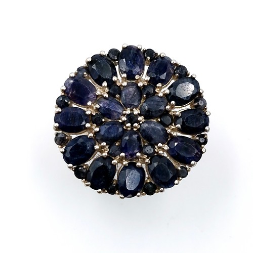 510 - Star Lot : A fabulous large sapphire floral ring. Size - R. Weight - 11.94 grams.  Brand new from th... 