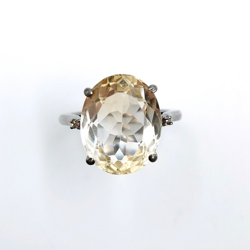 525 - A fine large citrine stone ring set in sterling silver with claw mount. Size - O. Weight - 4.78 gram... 