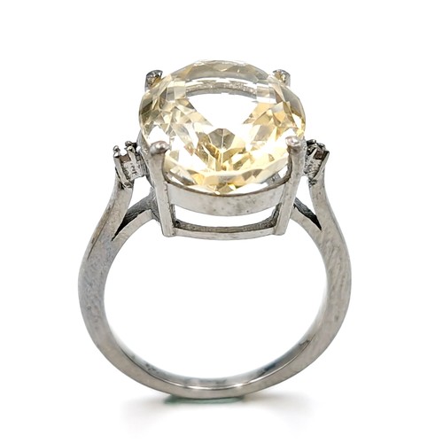 525 - A fine large citrine stone ring set in sterling silver with claw mount. Size - O. Weight - 4.78 gram... 