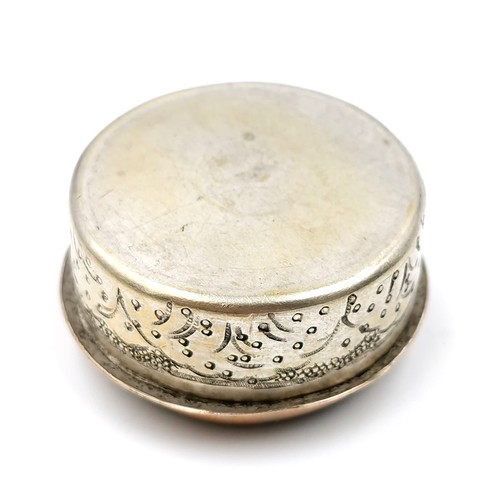 570 - A circular Antique Persian snuff box set with a mother of pearl picture design to lid depicting 18th... 