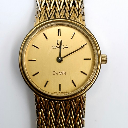 595 - Star Lot : An Omega De Ville ladies wristwatch with original gold metal mesh bracelet. Boxed.