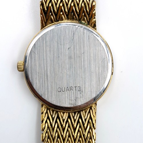 595 - Star Lot : An Omega De Ville ladies wristwatch with original gold metal mesh bracelet. Boxed.