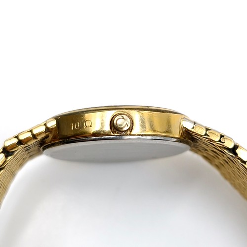 595 - Star Lot : An Omega De Ville ladies wristwatch with original gold metal mesh bracelet. Boxed.