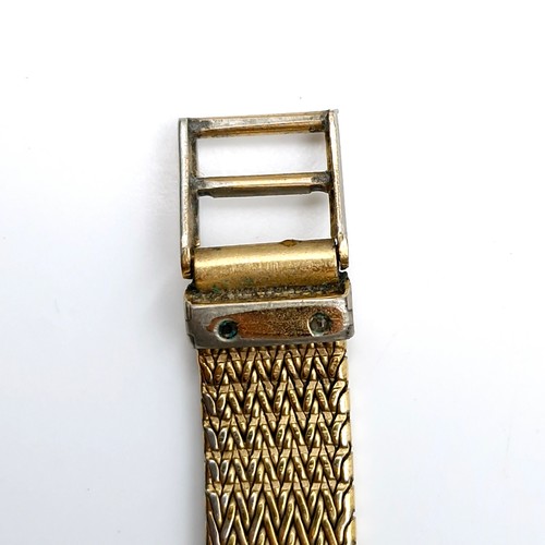 595 - Star Lot : An Omega De Ville ladies wristwatch with original gold metal mesh bracelet. Boxed.