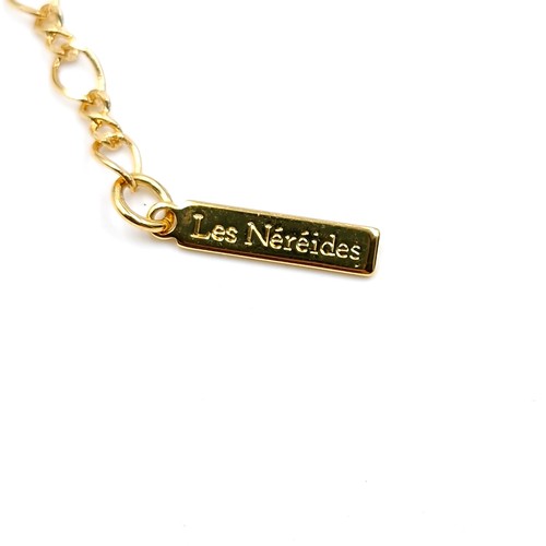 599 - A Les Nereides designer necklace with floral gem set design. Length of necklace - 42 cms. Weight - 1... 