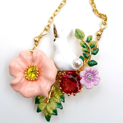 599 - A Les Nereides designer necklace with floral gem set design. Length of necklace - 42 cms. Weight - 1... 