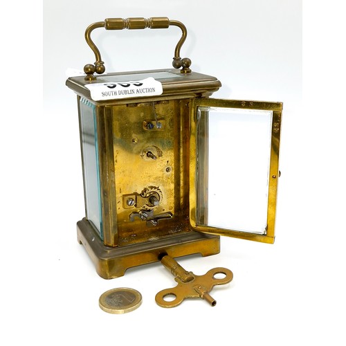 963 - An antique mechanical carriage clock. Marked made in France. nice clean example with glass sides and... 