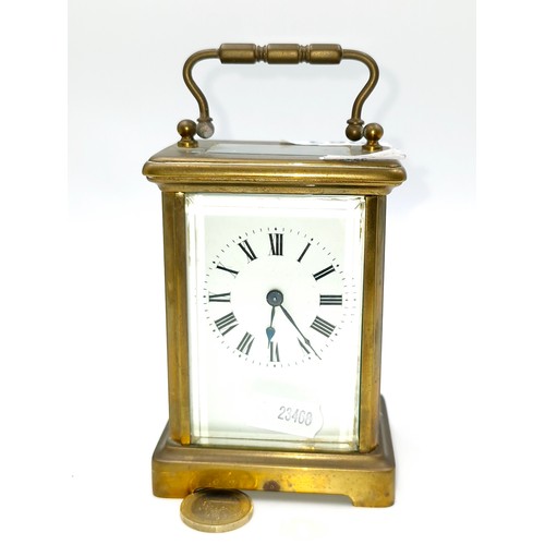 963 - An antique mechanical carriage clock. Marked made in France. nice clean example with glass sides and... 