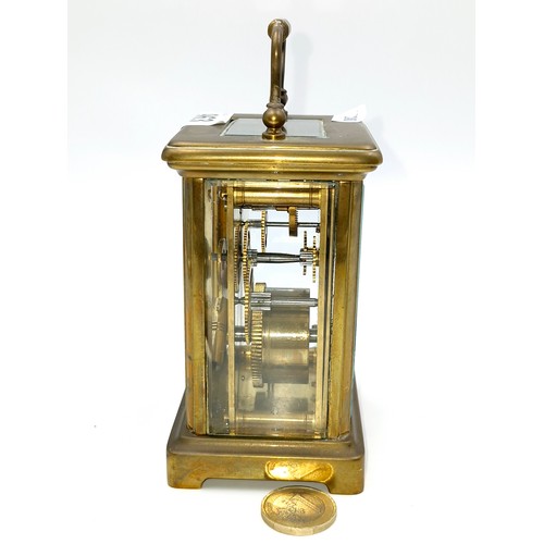 963 - An antique mechanical carriage clock. Marked made in France. nice clean example with glass sides and... 