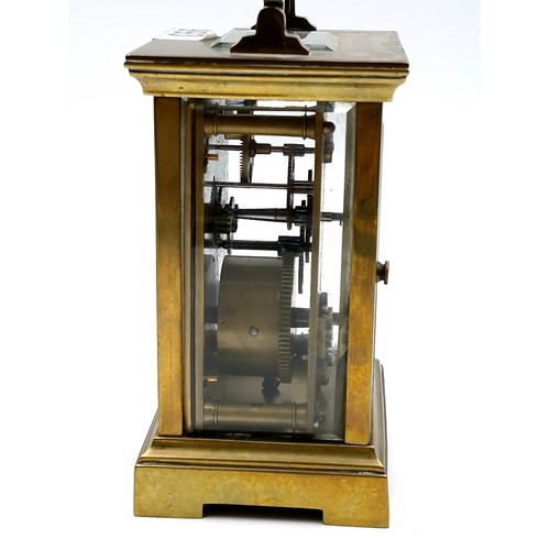 993 - A good antique brass French mechanical carriage clock with glass sides and top.