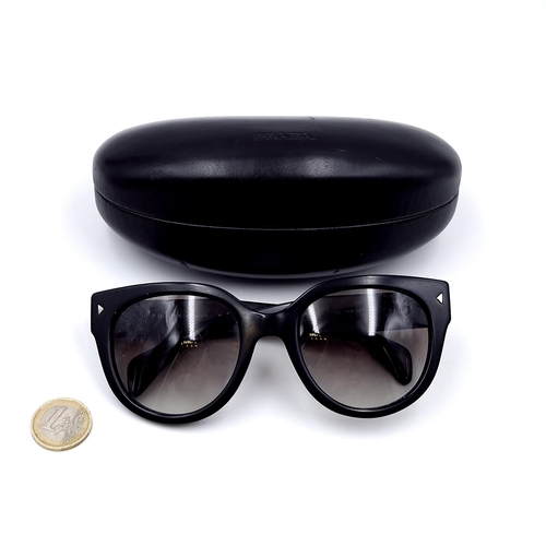 14 - A pair of Prada Milano DAL 1913 sunglasses set with black frames. Comes in original Prada box.