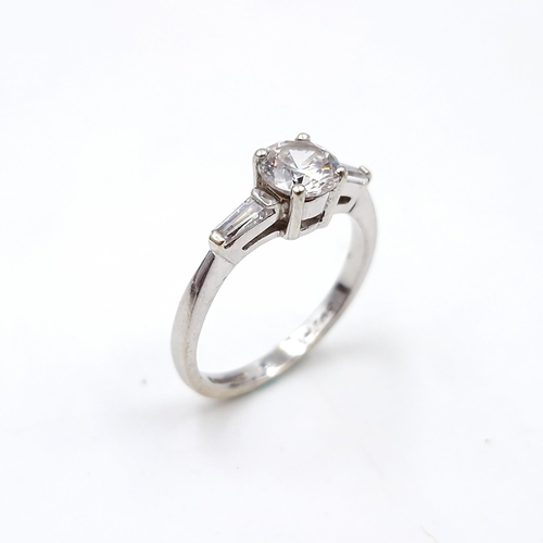 2 - A good nine carat white gold cubic zirconia stone ring. Size - J. Weight - 2.13 grams.